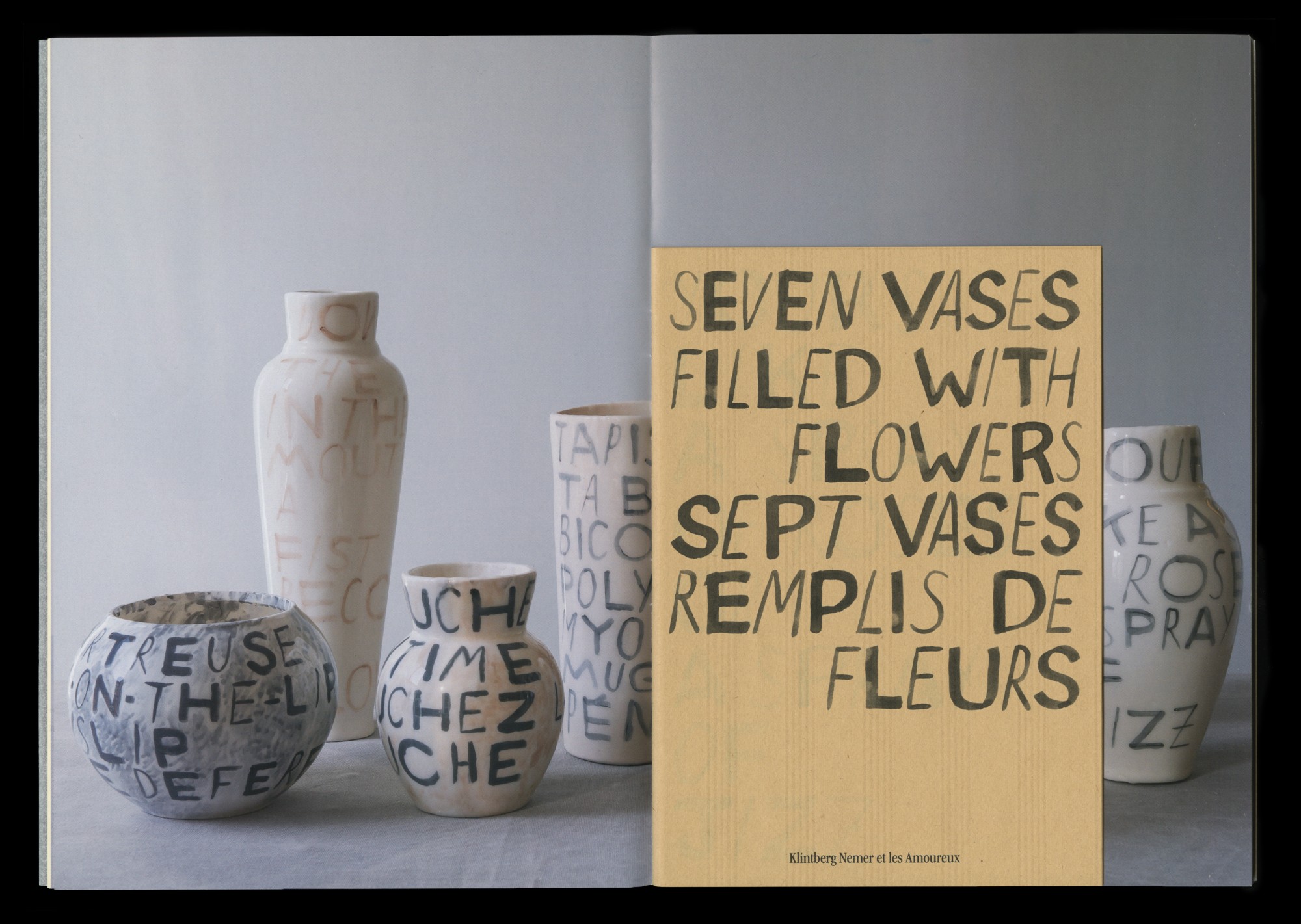 Seven vases filled with flowers 8