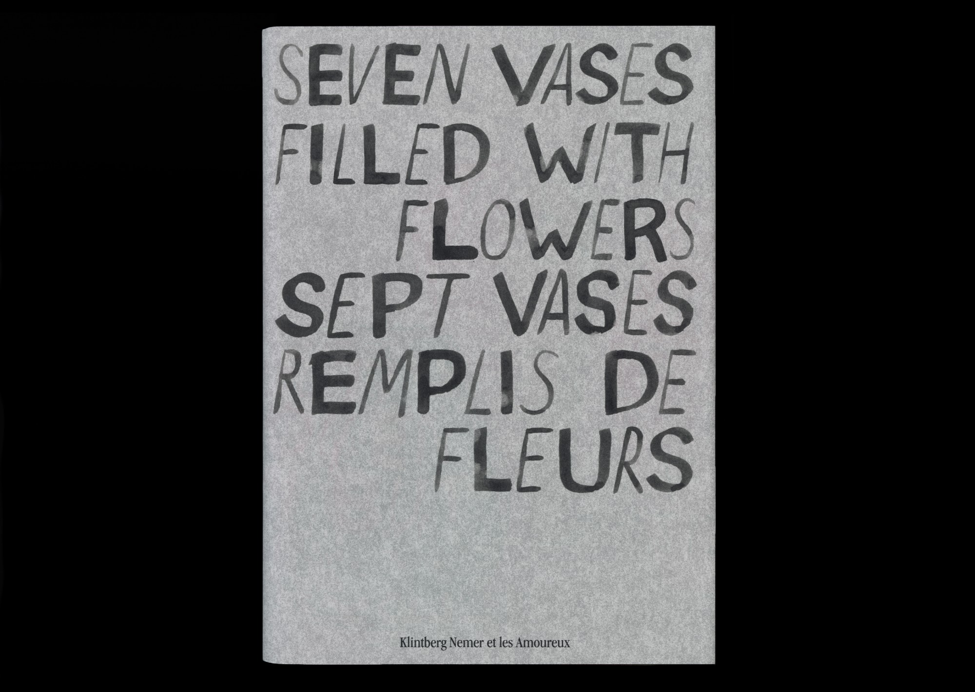 Seven vases filled with flowers 1