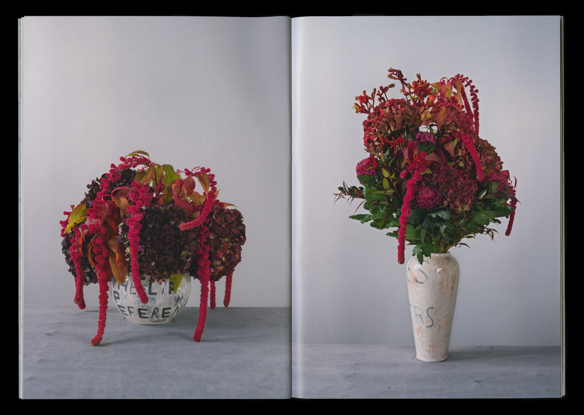 Seven vases filled with flowers 12